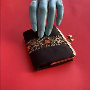 Black vintage embroidered wallet